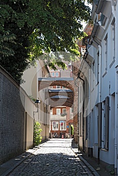 Narrow street in the medieval old town of Lubeck, Germany