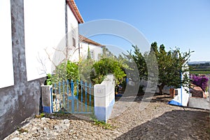 Narrow street in the medieval Portuguese City of Obidos