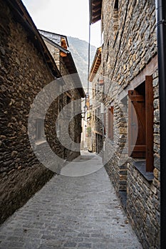 Narrow street in the medieval village Espot photo