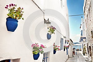 Narrow street, the mediterranean sea in the background, Bodrum Turkey