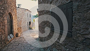 Narrow street in old medieval town of Siurana, Spain