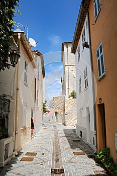 Narrow street in old town of Antibes, French Riviera, Provence, France