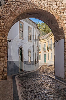 Narrow street in the Old Town (Cidade Velha) of Faro, Portuga