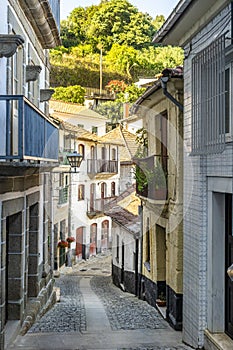Narrow street in old town of Entre-os-Rios, Douro Valley, Portugal photo