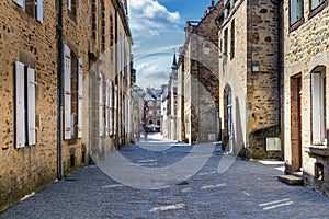 Narrow street with old traditional houses in histoical part of D