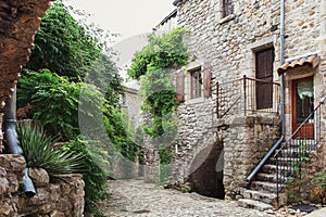 The narrow street in the picturesque village of Lanas in the ArdÃ¨che region