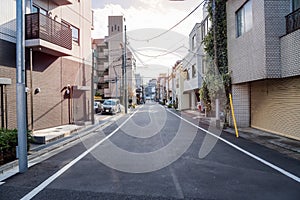 Narrow street through residentail buildings