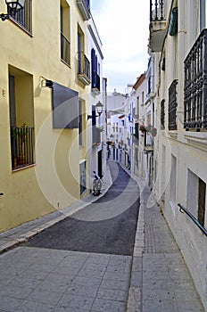Narrow street in Sitges, Catalonia, Spain