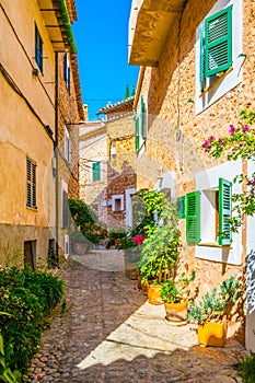 A narrow street in the spanish village Fornalutx at Mallorca