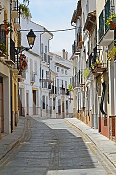 Sunny street of Spanish city Granada