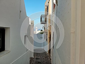 The narrow street in the town of Lindos, Rhodes, Greece