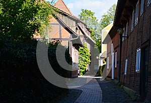 Narrow Street in the Town Nienburg at the River Weser, Lower Saxony photo