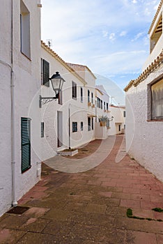 Narrow street, village in Menorca. Spain