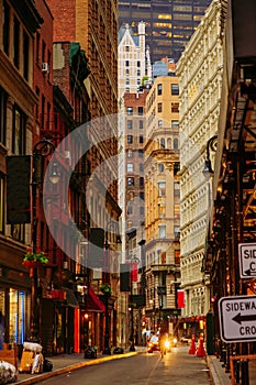 Narrow street of Wall Street District in New York City