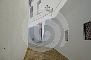 Narrow street in the white city of Arcos de la Frontera