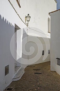 Narrow street in the white city of Arcos de la Frontera