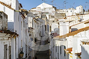 Narrow street between whitewash houses of Elvas, Alentejo, Portugal