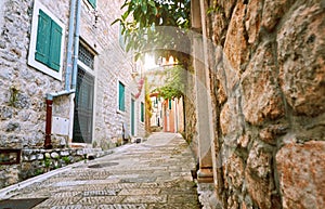 Narrow streets of historical old town Herceg Novi, Boka Kotor gilf. Popular touristic route to Kanli Kula fortress, Montenegro.