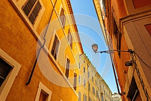 Narrow streets with old mediaval residential buildings in Rome, Italy