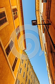 Narrow streets with old mediaval residential buildings in Rome, Italy