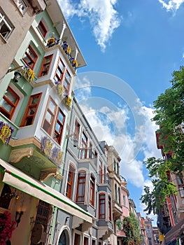 narrow streets of the picturesque Balat district of Istanbul, with its colourful houses and bohemian atmosphere, from below up