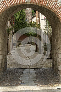 Narrow streets and picturesque buildings in hilltop medieval Penne d`Agenaise