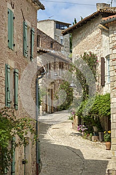 Narrow streets and picturesque buildings in hilltop medieval Penne d`Agenaise
