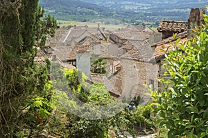 Narrow streets and picturesque buildings in hilltop medieval Penne d`Agenaise