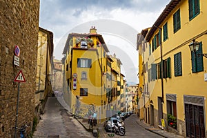 Yellow houses old street Florence Tuscany Italy