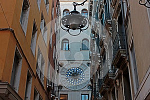 Narrow Venice Street with a flashlight, Italy photo