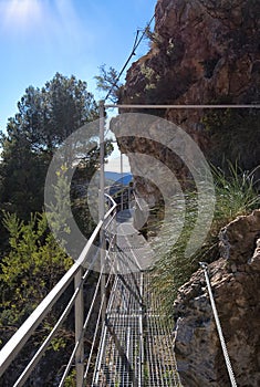 Narrow walkway on side of gorge, El Saltillo, Spain.