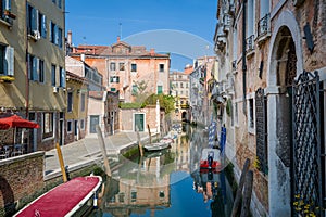 Narrow water channel in the center of Venice old town