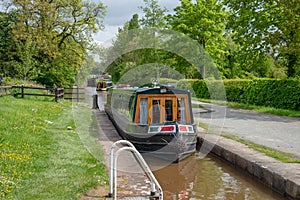 Narrowboat approaches a lock