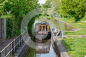 Narrowboat approaches a lock