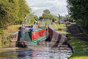 Narrowboat entering lock.