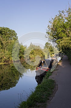 Narrowboat moored on canal photo