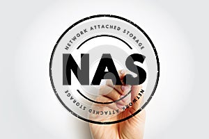 NAS Network-Attached Storage - file-level computer data storage server connected to a computer network, acronym text stamp concept