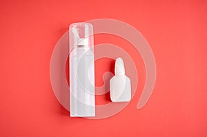 Nasal spray bottle composition, white template bottle on pink background