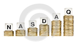 NASDAQ Stock Exchange Letters on Stacks of Gold Coins