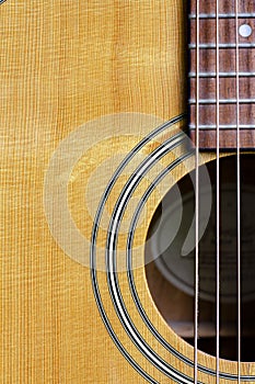 Nashville Acoustic Guitar Sound Hole and strings with detail of wood grain