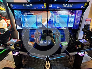 Nashville, Tennessee, U.S.A - June 22, 2022 - The double big screen of the Halo Fireteam Raven arcade video game