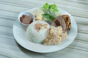 Nasi Bebek Kremes or Crunchy fried duck