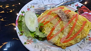 Nasi goreng pattaya or pattaya fried rice. Southest asian dish made from rice and covered with egg or omelette