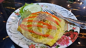 Nasi goreng pattaya or pattaya fried rice. Southest asian dish made from rice and covered with egg or omelette