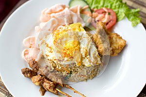 Nasi Goreng with prawn crackers and chicken satay