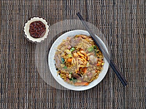 Nasi goreng with sambal, Indonesian fried rice with chili paste photo