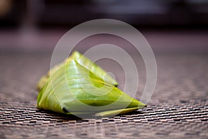 Nasi lemak is a Malay fragrant rice dish cooked in coconut milk and pandan or banana leaf