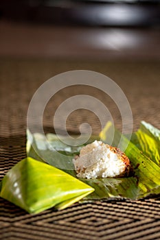 Nasi lemak is a Malay fragrant rice dish cooked in coconut milk and pandan or banana leaf