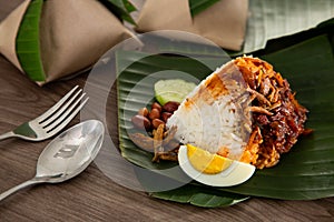 Nasi lemak pack in banana leaf, popular breakfast in Malaysia