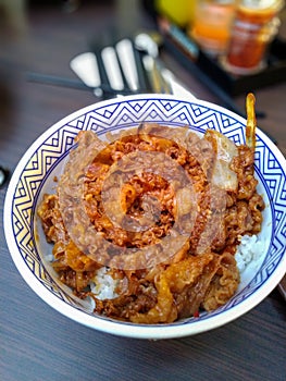 Nasi mangkok, or rice bowl with meat photo